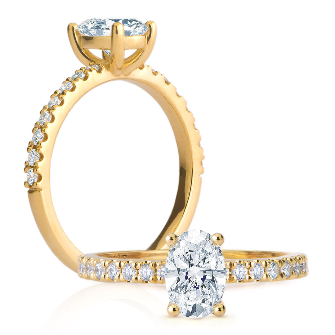 Bague diamant taille ovale et 16 diamants ronds sur or jaune 18kt