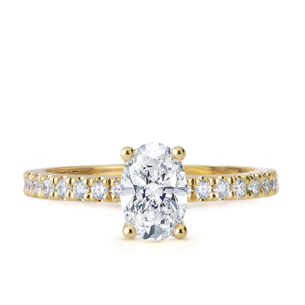
                  
                    Bague diamant taille ovale et 16 diamants ronds sur or jaune 18kt
                  
                