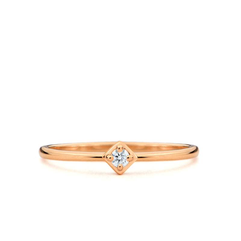 
                      
                        Milia gold ring with a diamond
                      
                    