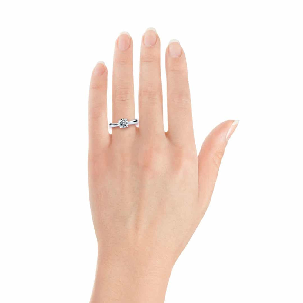 
                  
                    Bague de fiancailles Elodie diamant solitaire rond or blanc 18 carats SR-1064
                  
                