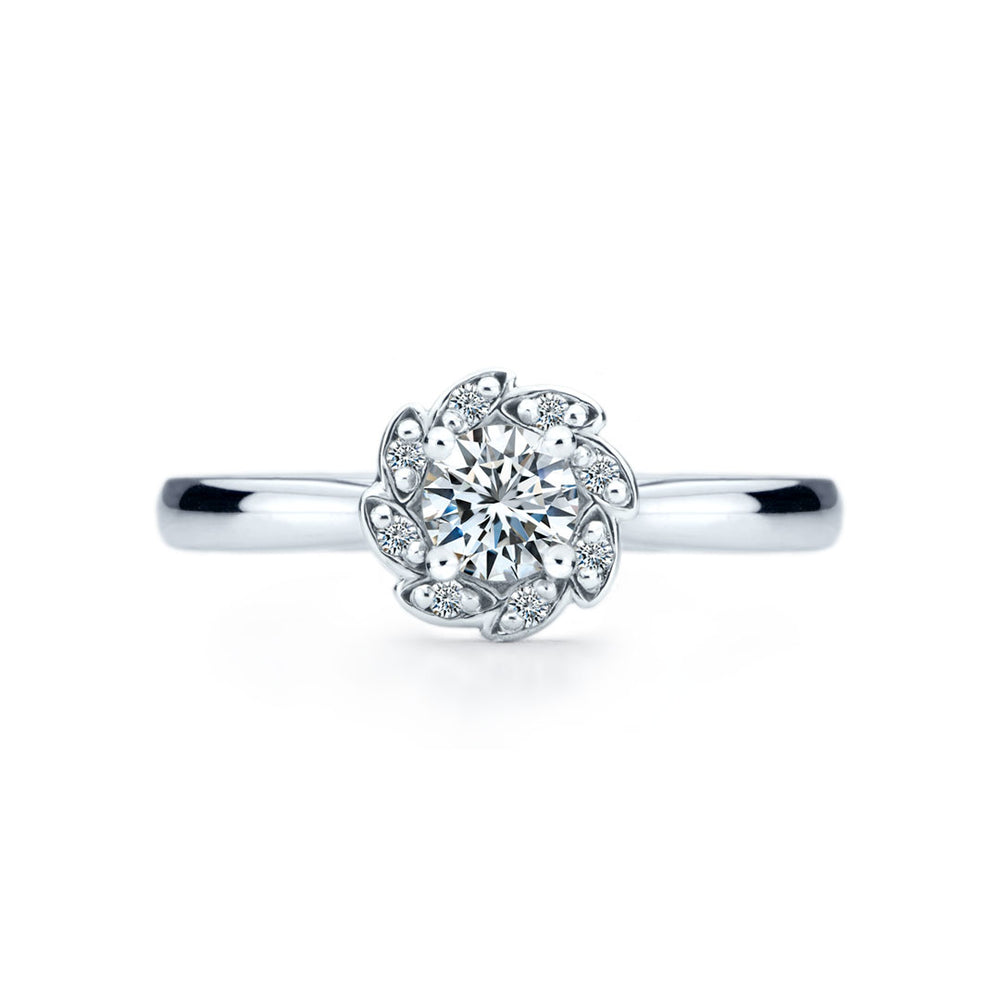 
                  
                    Bague de fiançailles Mia à diamant solitaire et simple halo en or 18 carats
                  
                
